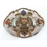 Egyptian Revival jewellery : An early - mid 20thC  gilt metal brooch depicting pharaoh head and