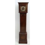 3 Train Grandmother clock : An oak cased 1920's Grandmother clock with brass 7 7/8" Westminster