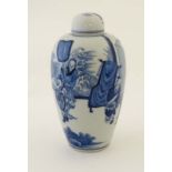 A Chinese blue and white lidded vase, decorated with figures, having artemisia leaf mark to base