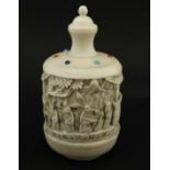 A c.1900 carved ivory large Chinese snuff bottle having carved figures to sides and small
