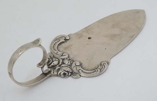 A Continental  white metal cake slice with loop handle marked .800. The whole 5 1/2" long