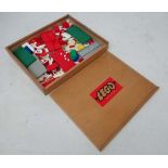 A large box of early '' Lego '' In wooden branded box. A selection of pieces predominantly in