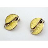 Norwegian Silver : A pair of silver gilt clip earrings formed as pairs of leaves with yellow