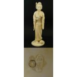 Japanese Okimono : A 19thC Tokyo School? carved ivory figure of a bijin holding a puzzle ball with