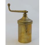 A vintage 'Jamboli' brass food / pasta press containing four circular shaped sections within for