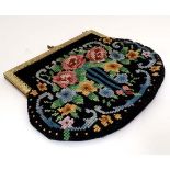 Vintage Retro : A circa 1920's wool tapestry bag, with black back ground and floral design and