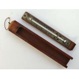 An early 20thC mahogany cased doctors travelling thermometer with unusual drop down section  7" long