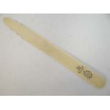 A Victorian ivory page turner with monogram and motto ' En bon espoir ' (in good hope or faith ) 12"