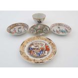 A collection of 5 Chinese ceramics to include: A small tea bowl decorated with figures, 3 1/2''