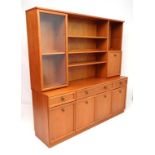 Vintage Retro : A British G-Plan  ( red label ) teak sideboard of three drawers and 4 cupboard doors