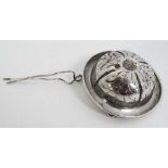 A white metal tea strainer with spout attachment. Marked. H LE MARIL  CONDITION: Please Note -  we