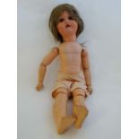 A early / mid 20thC  doll by EVP with blue sleeping plastic eyes, painted features and ball-