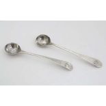 Two Geo III salt spoons one hallmarked London 1799 the other London 1800. The longest 4" (16g)