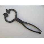 An 18thC cast iron folding pliar form sugar cutter 8" long  CONDITION: Please Note -  we do not make