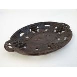 A c.1900 carved Black Forest bread plate, having grape vine decoration 12 1/2" wide  CONDITION: