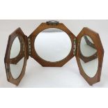 Campaign : An octagonal walnut cased  folding mirror with convex mirror and plain mirror within