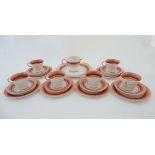 A Shelley Regent shape part tea set, decorated in bands of pink and brown on a white ground, to