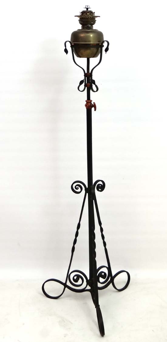 A 19thC wrought iron telescopic oil lamp / standard lamp.  CONDITION: Please Note -  we do not