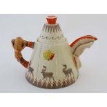 A Clarice Cliff for Newport Pottery teapot and cover of " TeePee " form, with painted relief