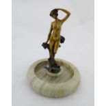 After Ferdinand Preiss :   A gilt cast bronze  of a female figure appearing from the waves on  an