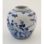 A Chinese blue and white ginger jar of bulbous form , decorated with images of birds and insects