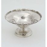 A silver bon bon dish of circular foot with pedestal foot. Hallmarked London 1937 maker Marson &