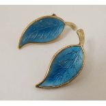 Danish Silver : A  pair of silver gilt clip earrings formed as leaves with guilloché enamel