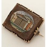 Grand Tour / Micro Mosaic jewellery : A gilt metal brooch set with central micro mosaic scene