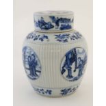 A Chinese blue and white ginger jar with lid, the Cartouches and lid decorated with female figures