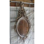 Bevelled oval and gilt mirror  CONDITION: Please Note -  we do not make reference to the condition