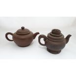 Two Yixing red ware tea pots comprising one decorated with incised dragon and inscription and