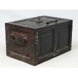 A Victorian cast iron strong box with twin carry handles, having riveted hinges and heavy lock