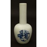 A Chinese blue and white bottle vase, the cartouches and lid decorated with female figures in