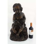 A large Victorian style wooden carving depicting a seated child holding flowers 24" high  CONDITION: