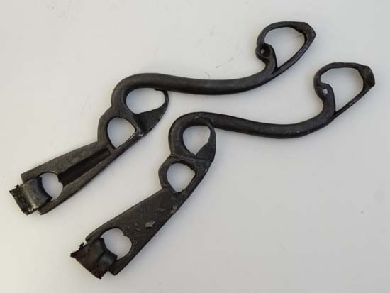 Equestrian: A pair of 17thC shanks from a wrought iron curb bit.  8 1/4'' long.  CONDITION: Please