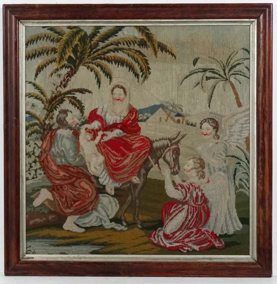 Woolwork : a moulded Rosewood framed coloured picture of Joseph and Mary ( sat on an ass ) on the
