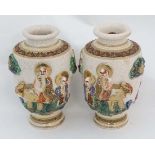 A Pair of hand painted Japanese Satsuma style Moriage Baluster vases, decorated in high relief