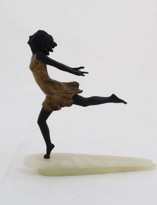 A cast and patinted bronze sculpture in the Art Deco style depicting a young girl upon an - Image 4 of 6