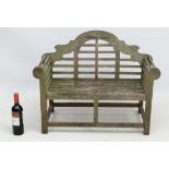 Garden and Architectural : A weathered teak Lutyens style childs Garden bench with scroll arms ,