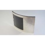 An Italian silver photograph frame of convex form. Marked  'Gianni Versace '. The whole 9 1/4" wide