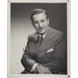 Autograph :  Walt Disney  ( 1901-1966) , an 8 x 10" Black and White photograph with blue ink steel