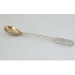 A Geo IV silver fiddle pattern mustard spoon with gilded bowl. Hallmarked London 1827 5" long (