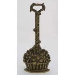 A c.1900 cast brass lead weighted door porter / stop in the form of a basket of flowers 14" high