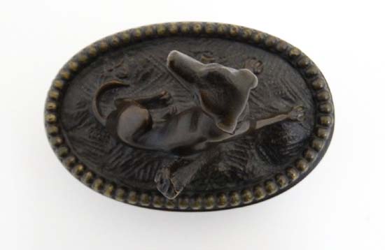 A Regency patinated bronze oval desk weight in the form of a sejant dog. 3 1/4" wide x 2 3/4" - Image 5 of 6