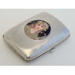 A silver cigarette case hallmarked Sheffield 1898 maker William Neale & Son. 3 1/4" x 2 1/2" x 1/