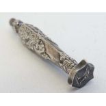 A desk seal with shield shaped silver seal with engraved armorial. The whole 2 1/4" high