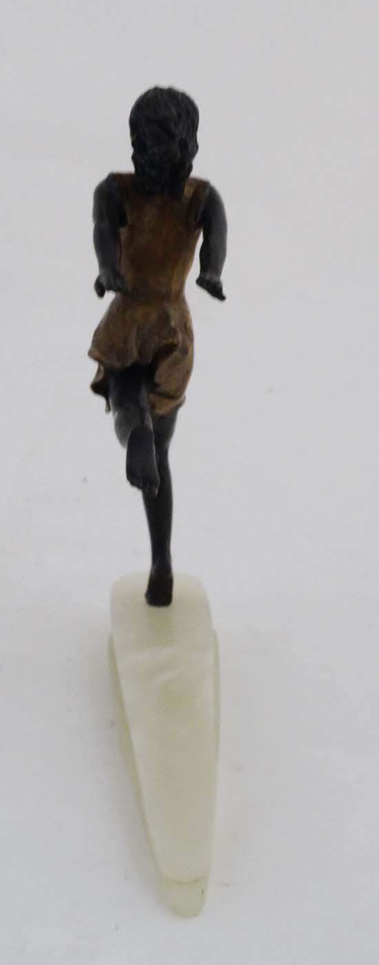 A cast and patinted bronze sculpture in the Art Deco style depicting a young girl upon an - Image 5 of 6