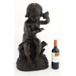 A large Victorian style wooden carving depicting a seated child holding a flower 24" high