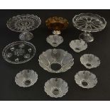 Assorted glass ware : a collection of moulded glass to include 3 cake stands / tazzas , cake plate,