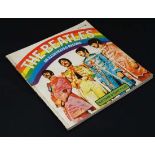 ' The Beatles : An Illustrated Record ' , a 128 page critical guide to the musical and personal